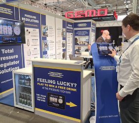 Various photos of Pressure Tech's exhibition stand at the Hydrogen Tech World Expo in Hamburg showcasing the new iPad game launched.